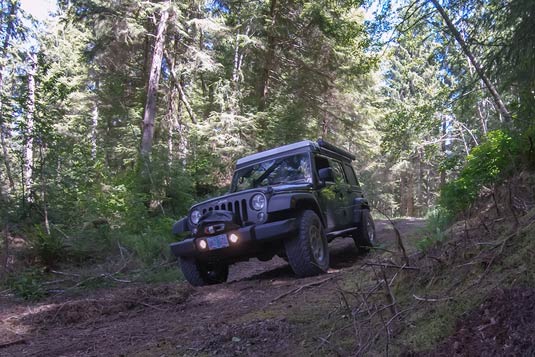 Me and my Jeep working our way down a logging road in the Oregon coast range mountains