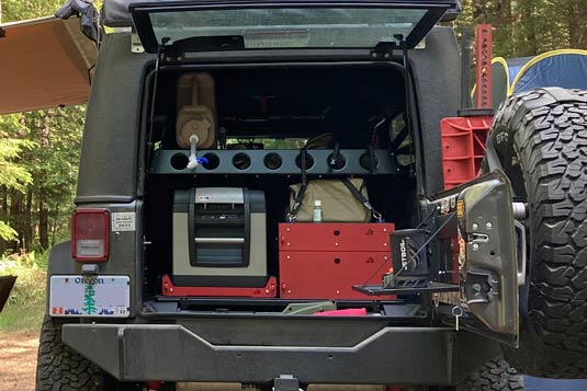 The rear cargo area of my Jeep JK for camping