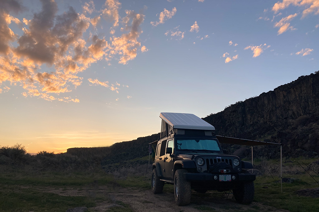 Jeep camping, sunset over Caldron Linn on the Snake River in Idaho